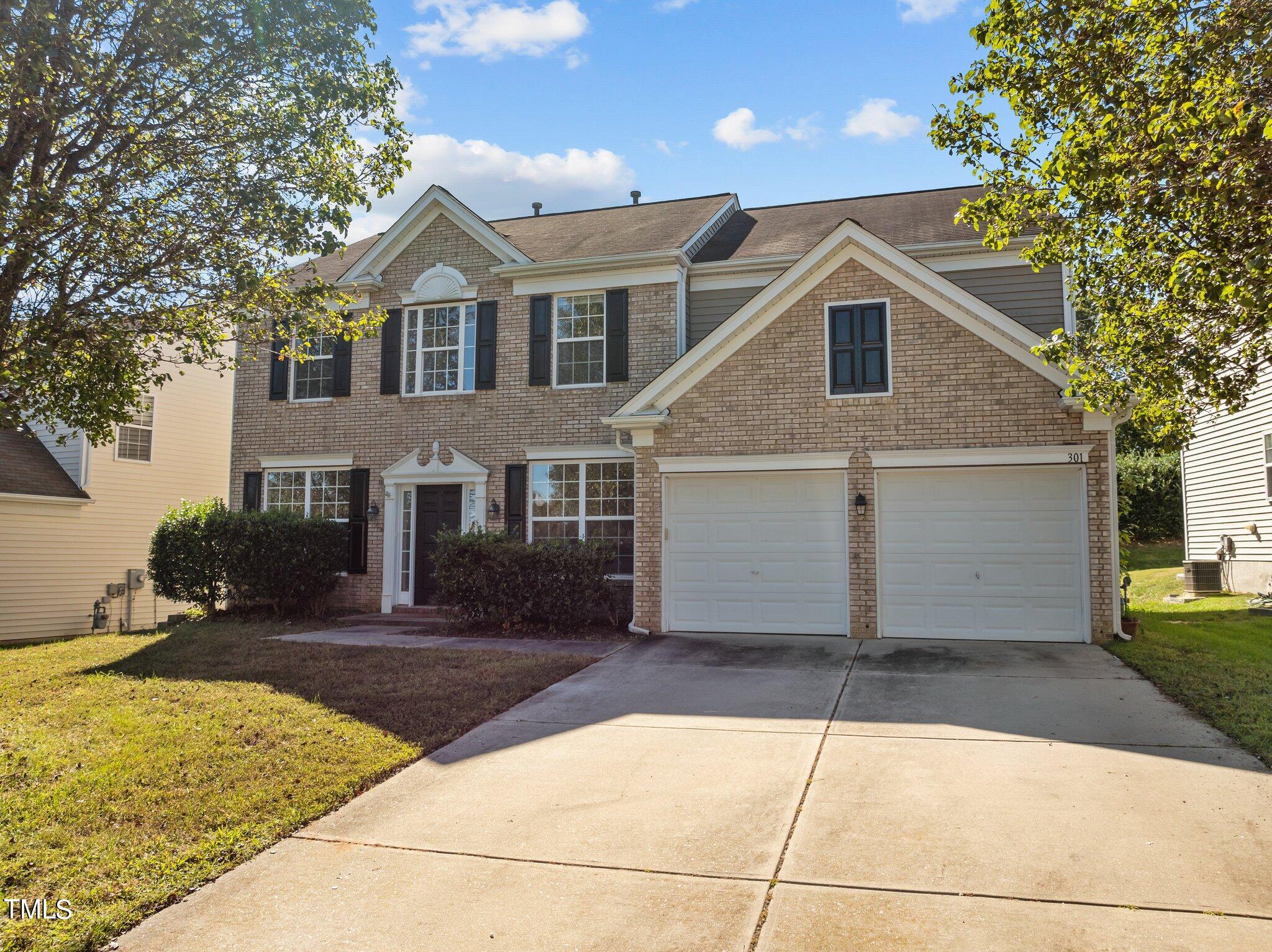 a front view of house with yard