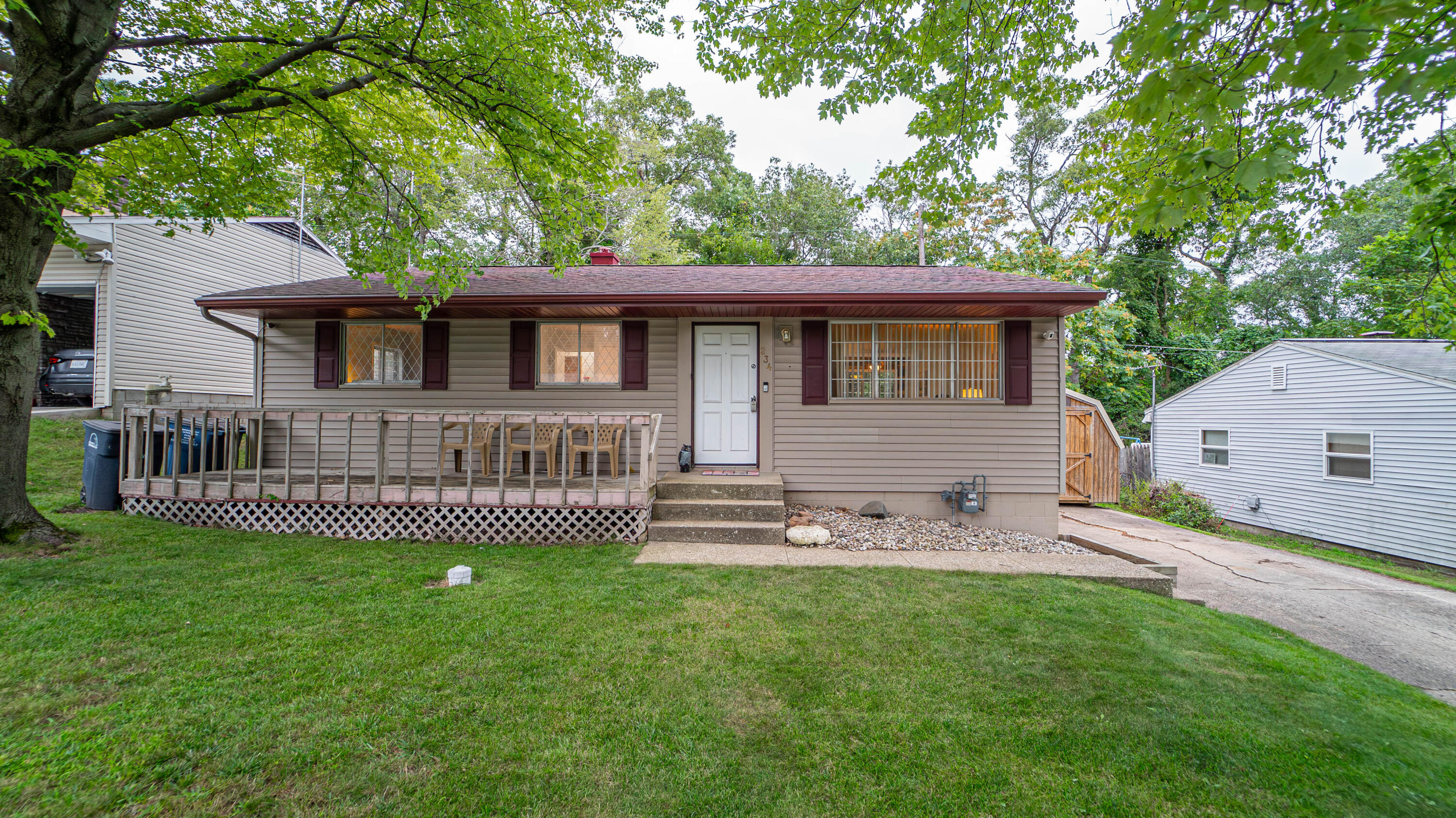 front view of a house with a yard