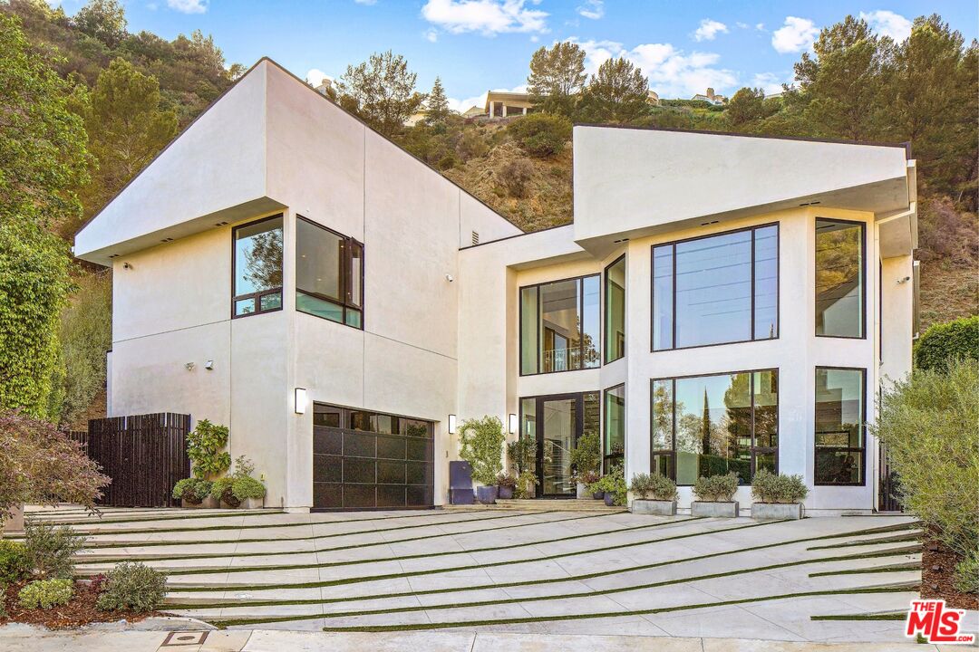 a front view of a house with a balcony