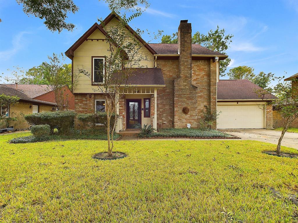 a front view of a house with swimming pool