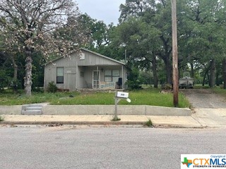 front view of house with a small yard