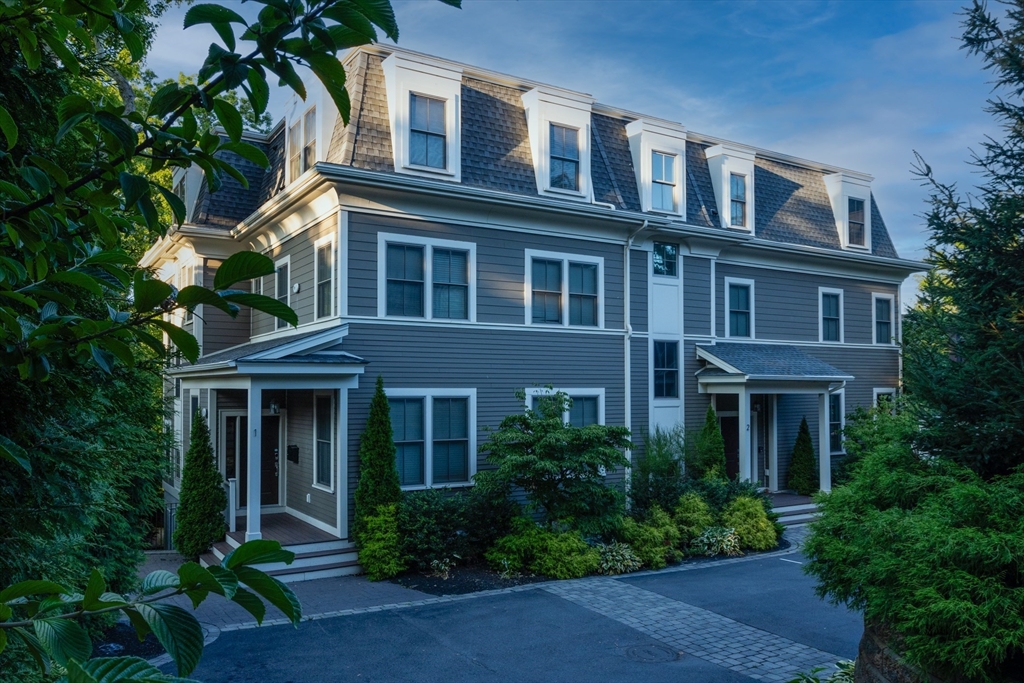 a front view of a multi story residential apartment building