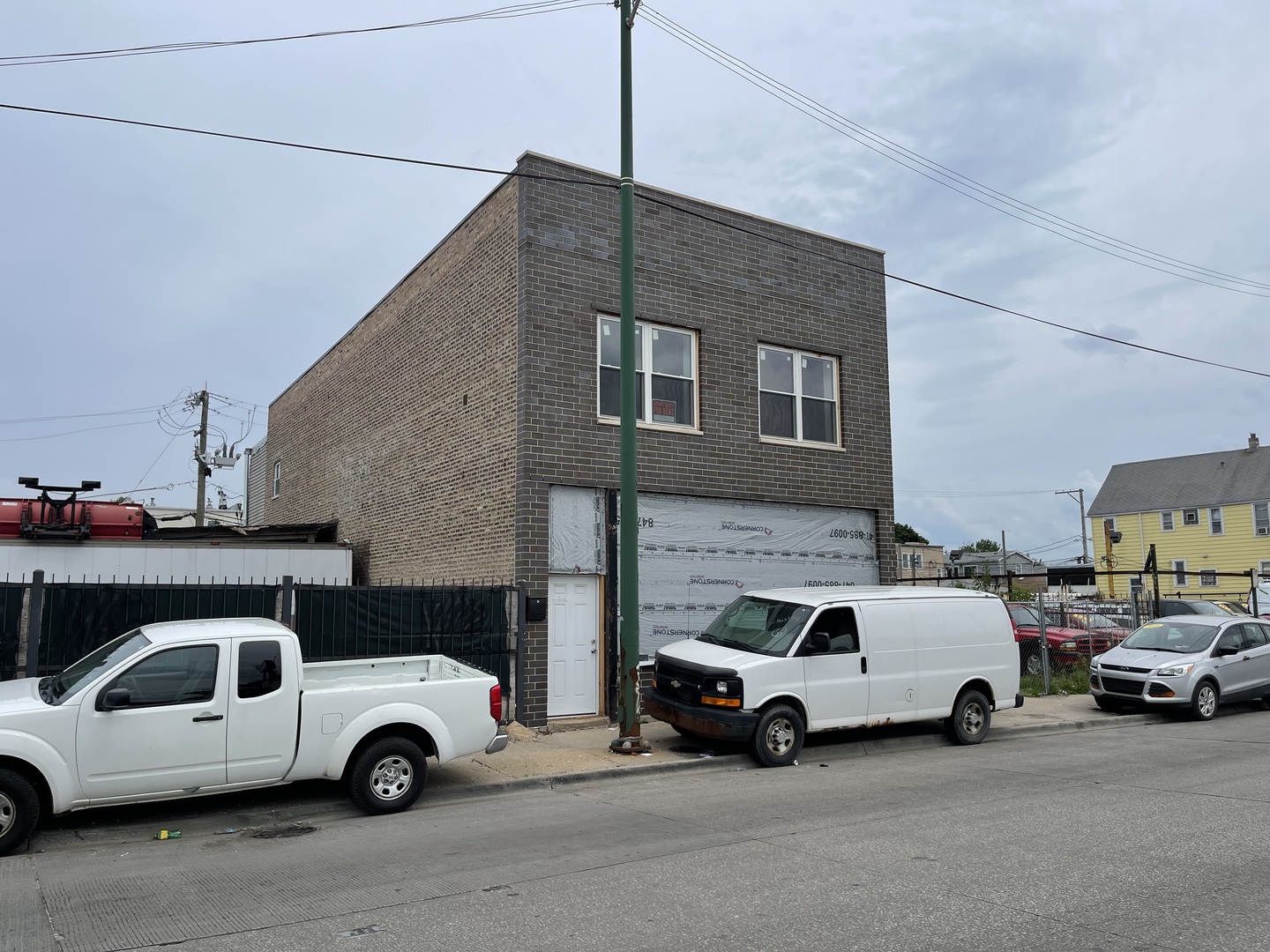 a car parked in front of a house