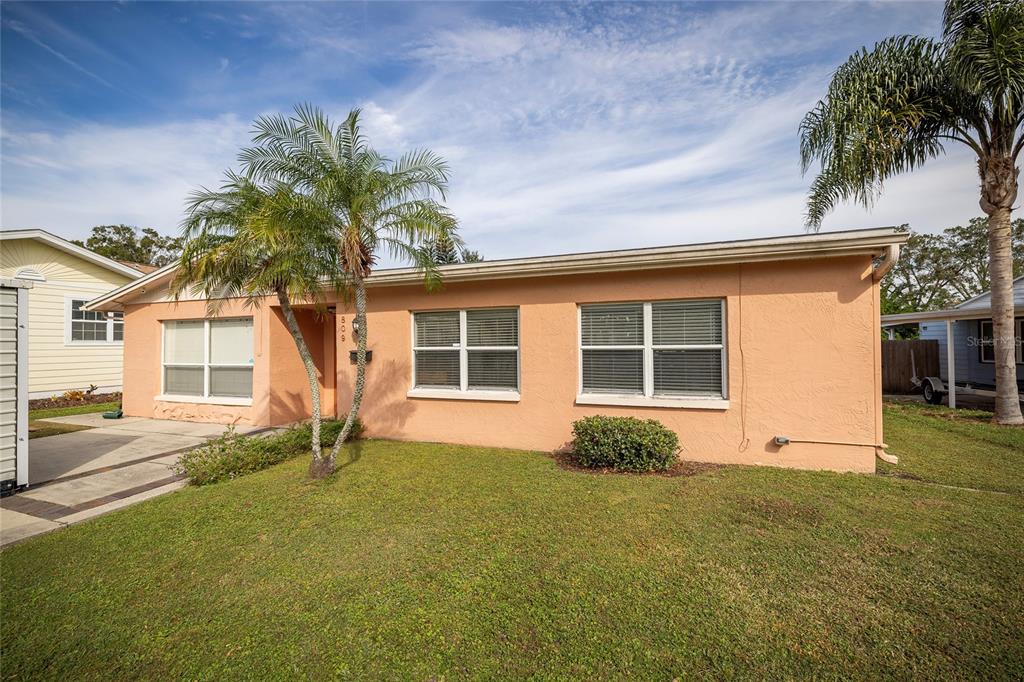 front view of a house with a yard