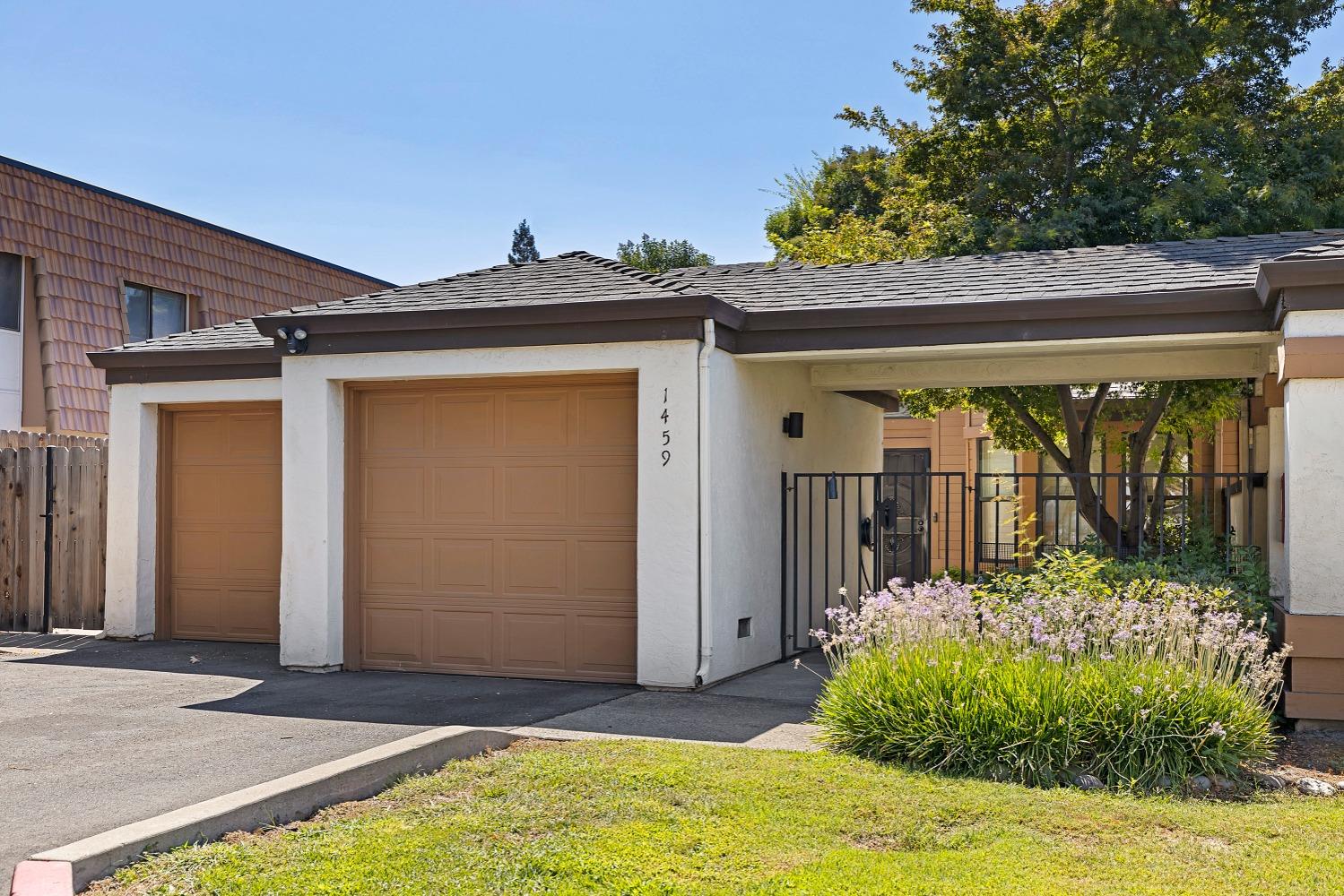 End unit .  Courtyard entry, two car garage