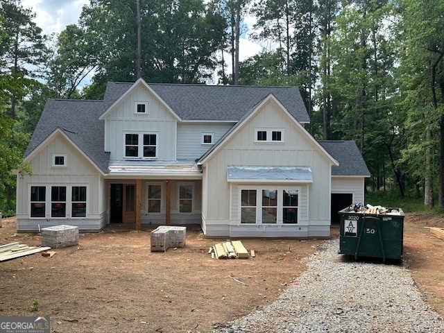 a front view of a house with parking space