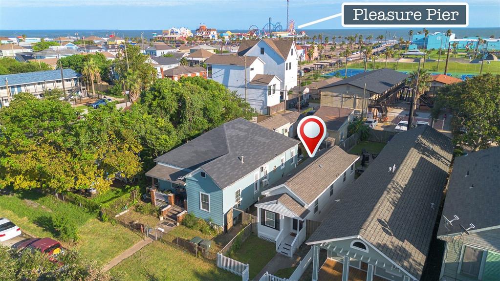 an aerial view of a house with swimming pool