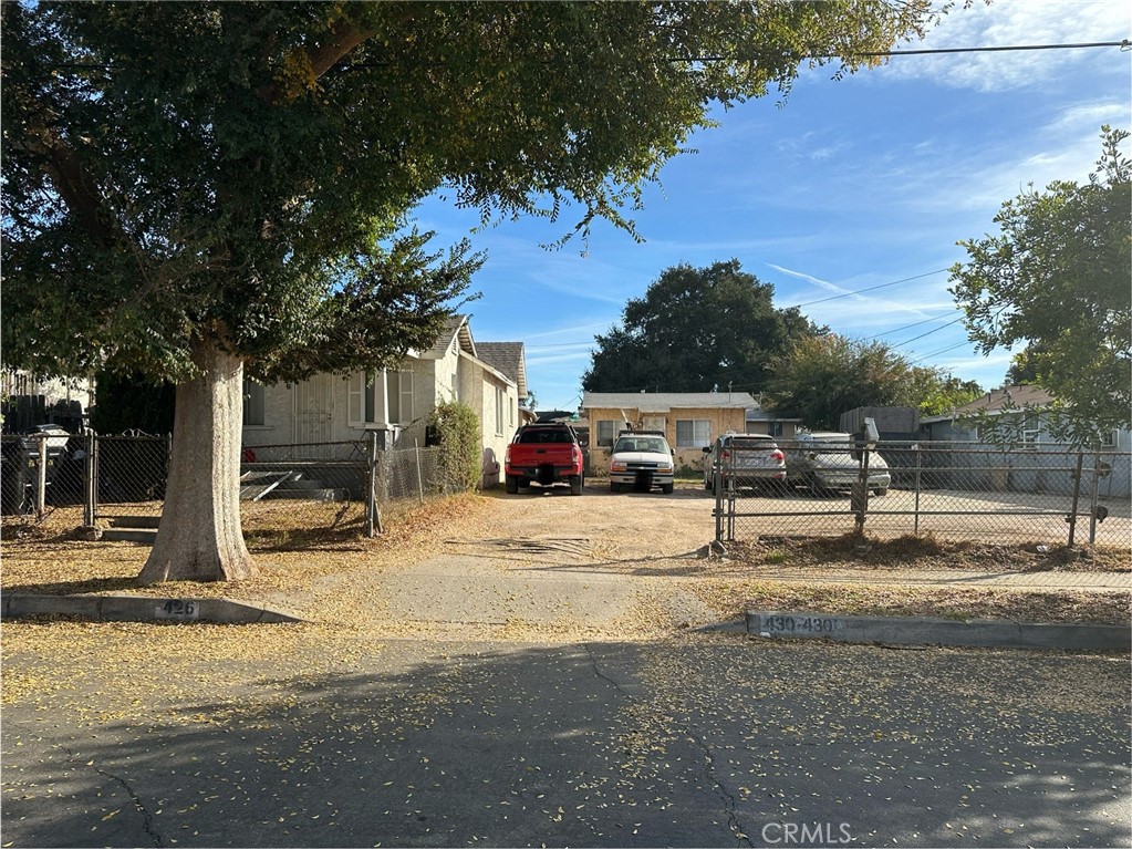 a view of street with benches