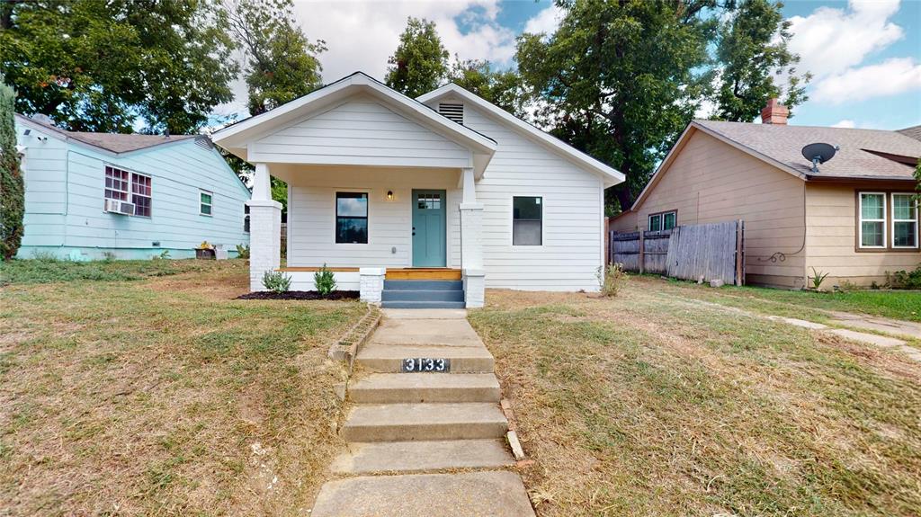 a front view of house with yard