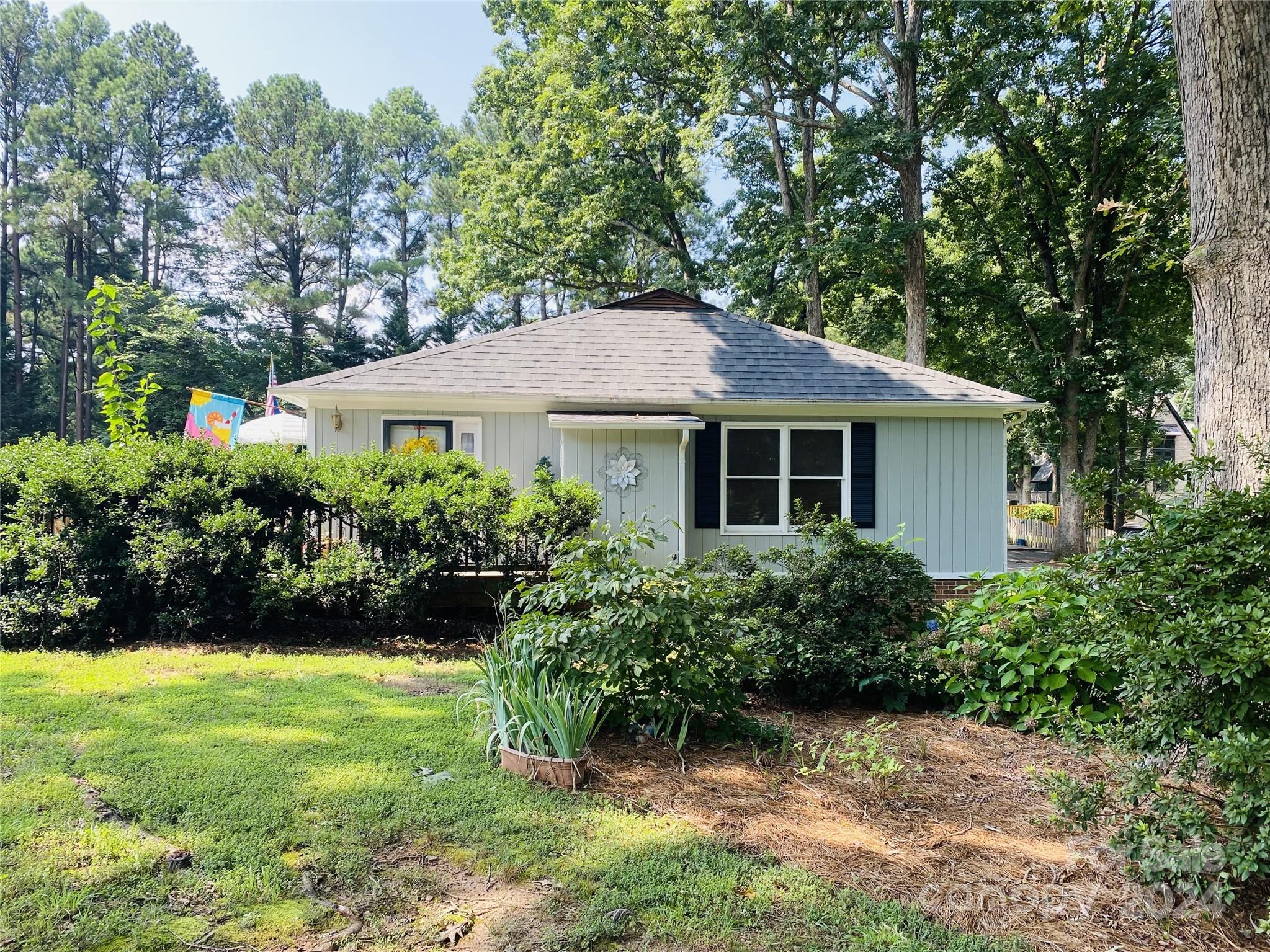 a view of a house with a garden