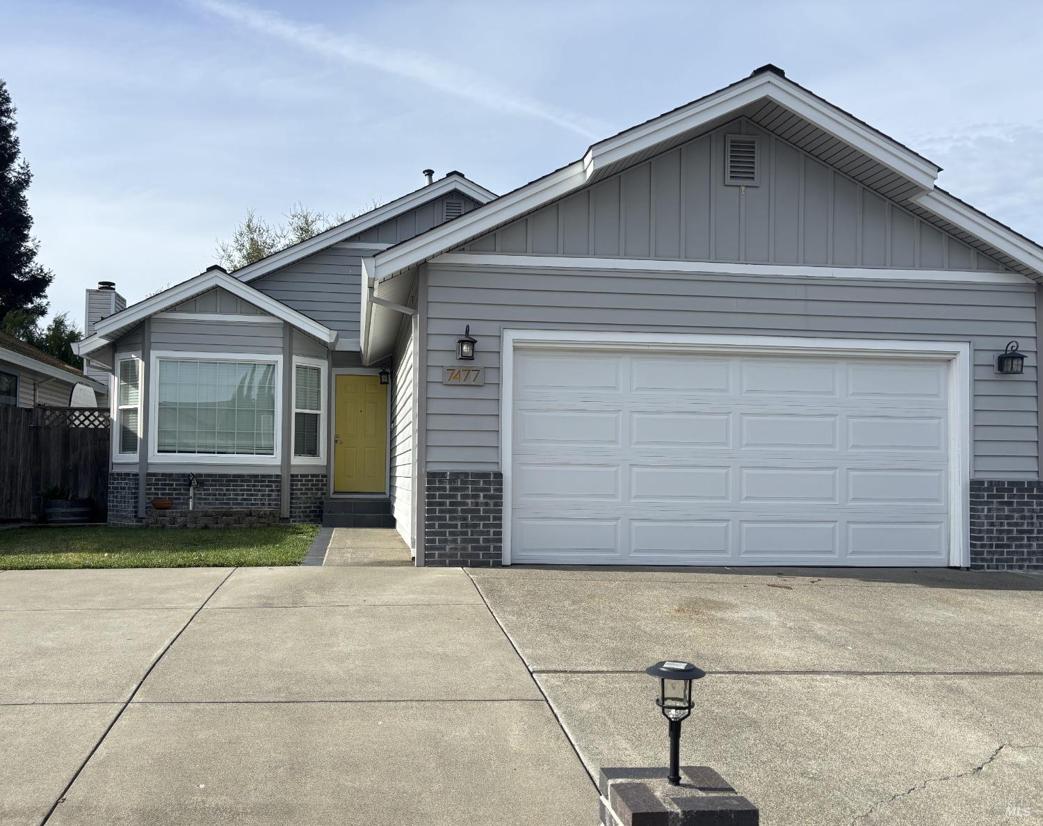 a view of house with garage