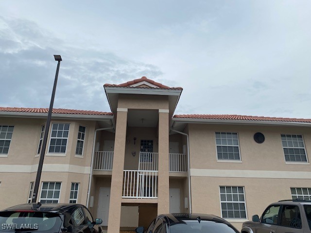 a front view of a house with yard