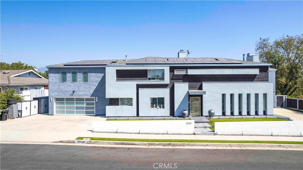 a view of a house with a swimming pool