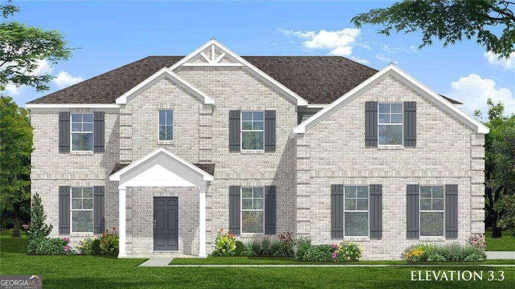 a view of a brick house next to a yard with big trees