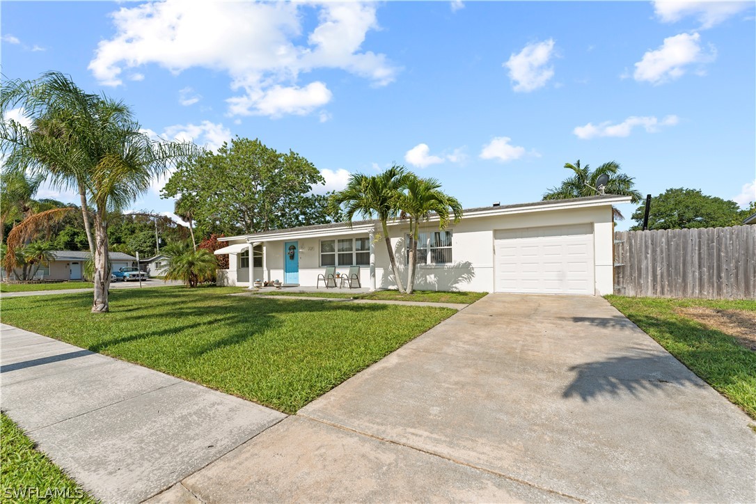 front view of a house with a yard