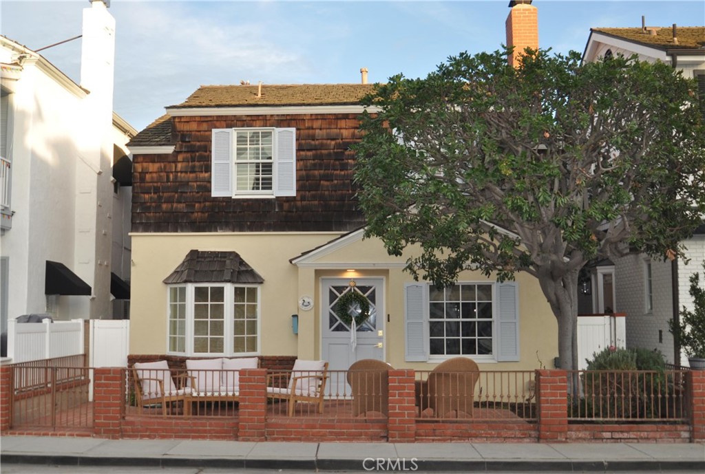 a front view of residential houses with stairs