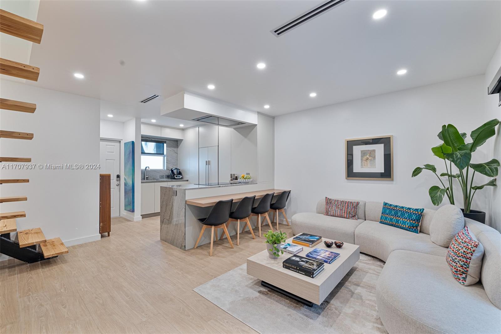 a living room with furniture and a couch