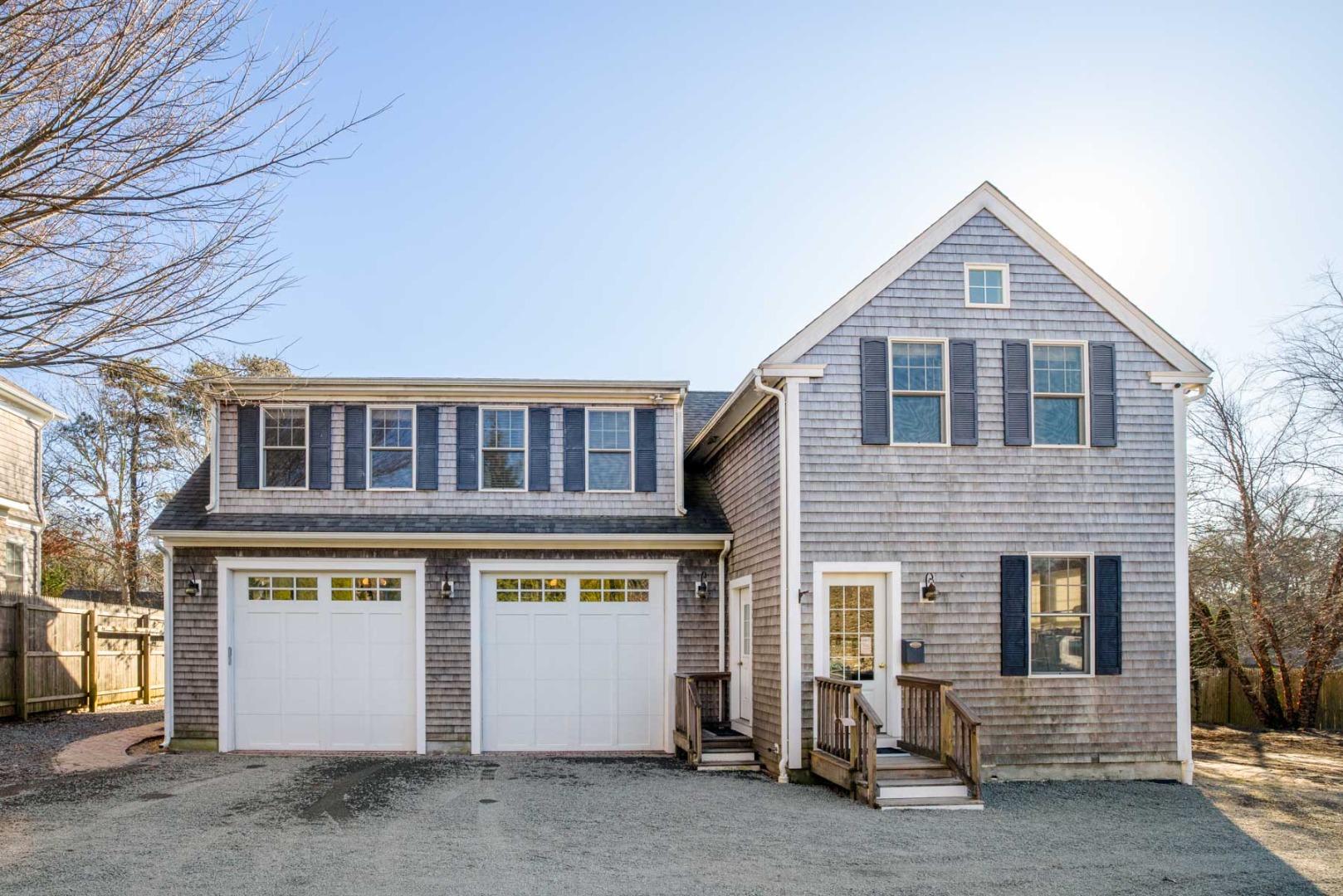 a front view of a house with a garage