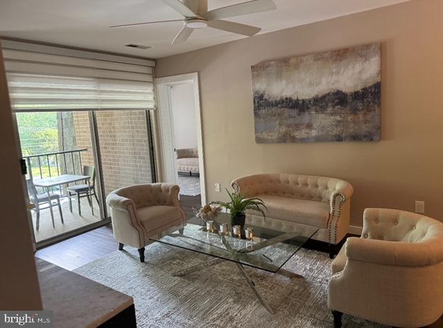 a living room with furniture and a window