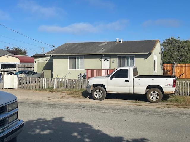 a car parked in front of a house