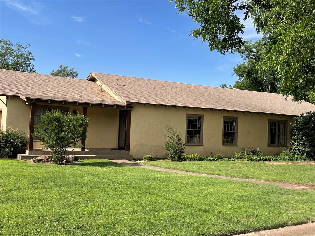 a front view of house with yard