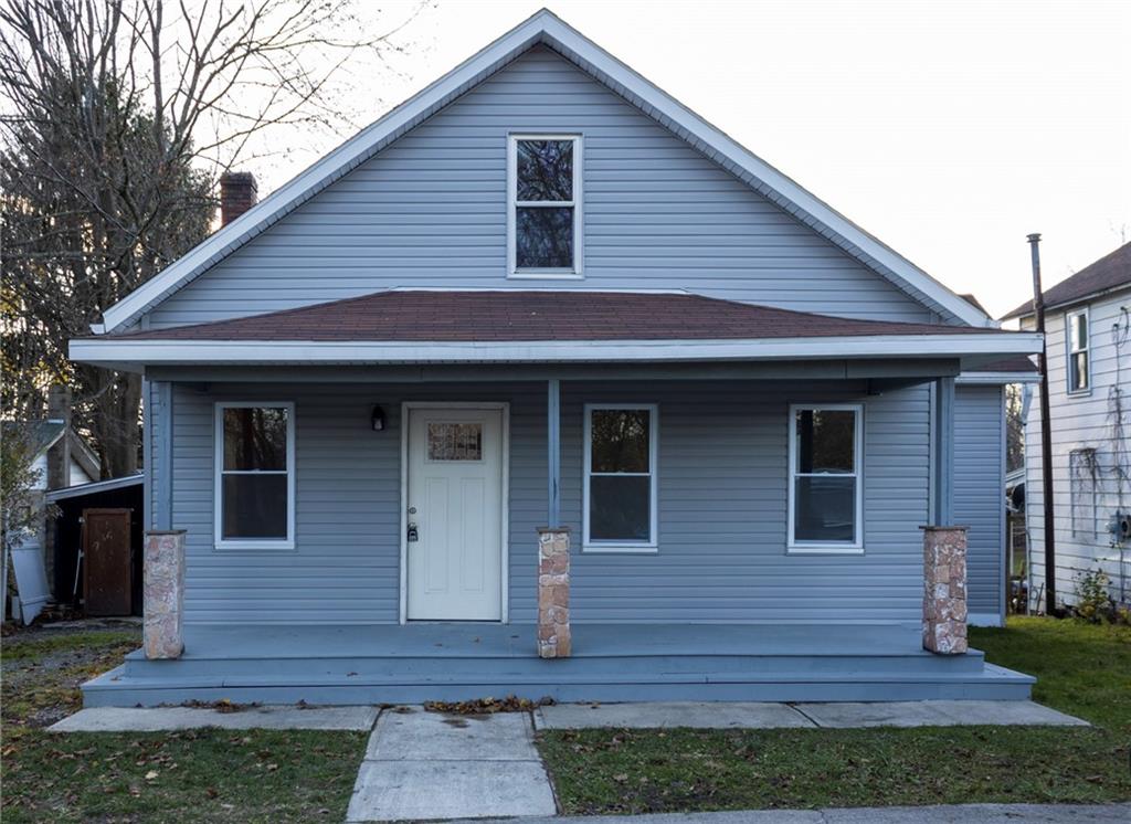 a front view of a house with wooden floor