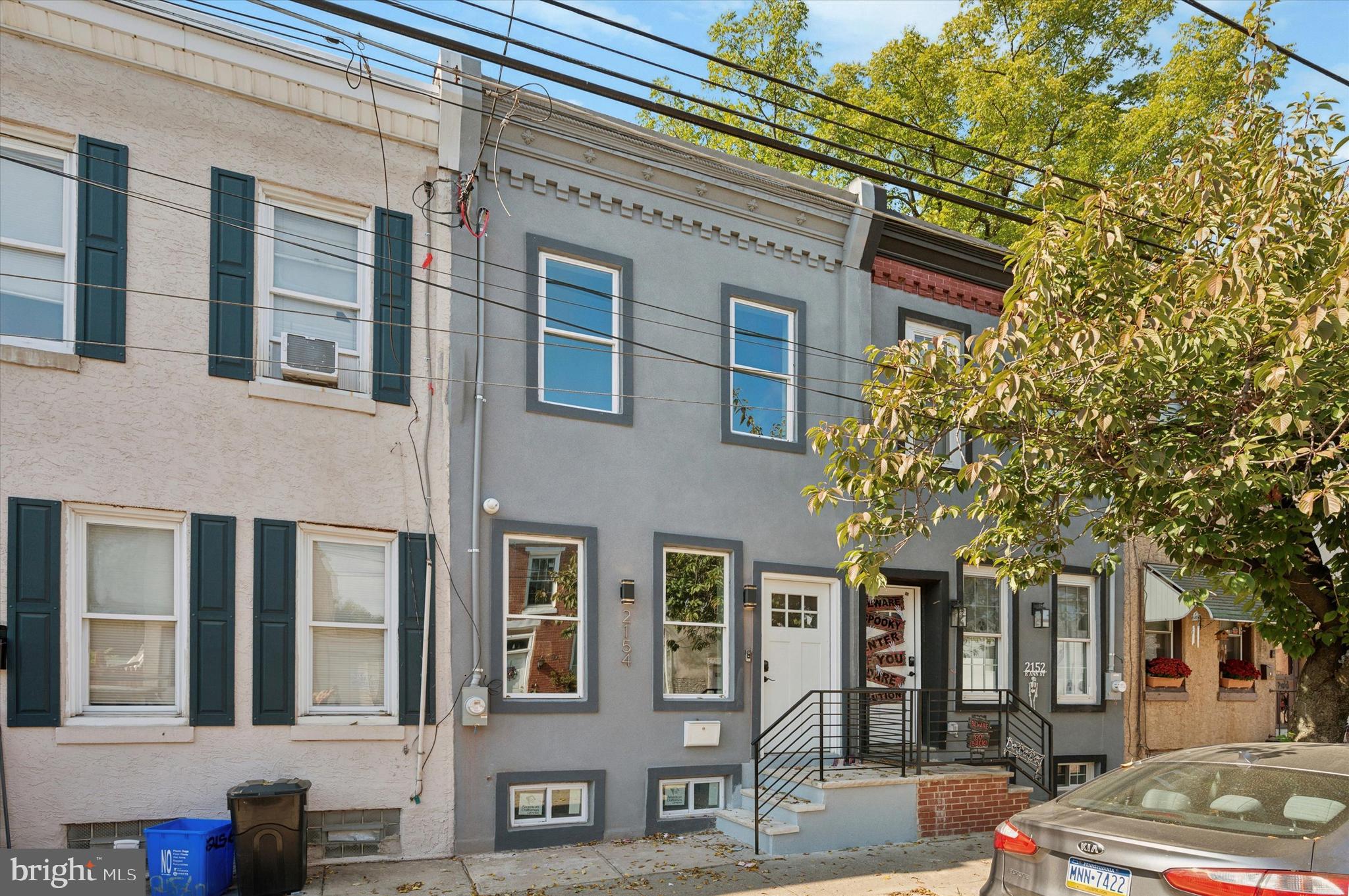 a front view of a building with street view