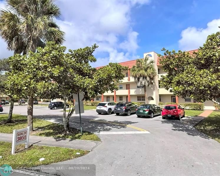 a building with trees in front of it