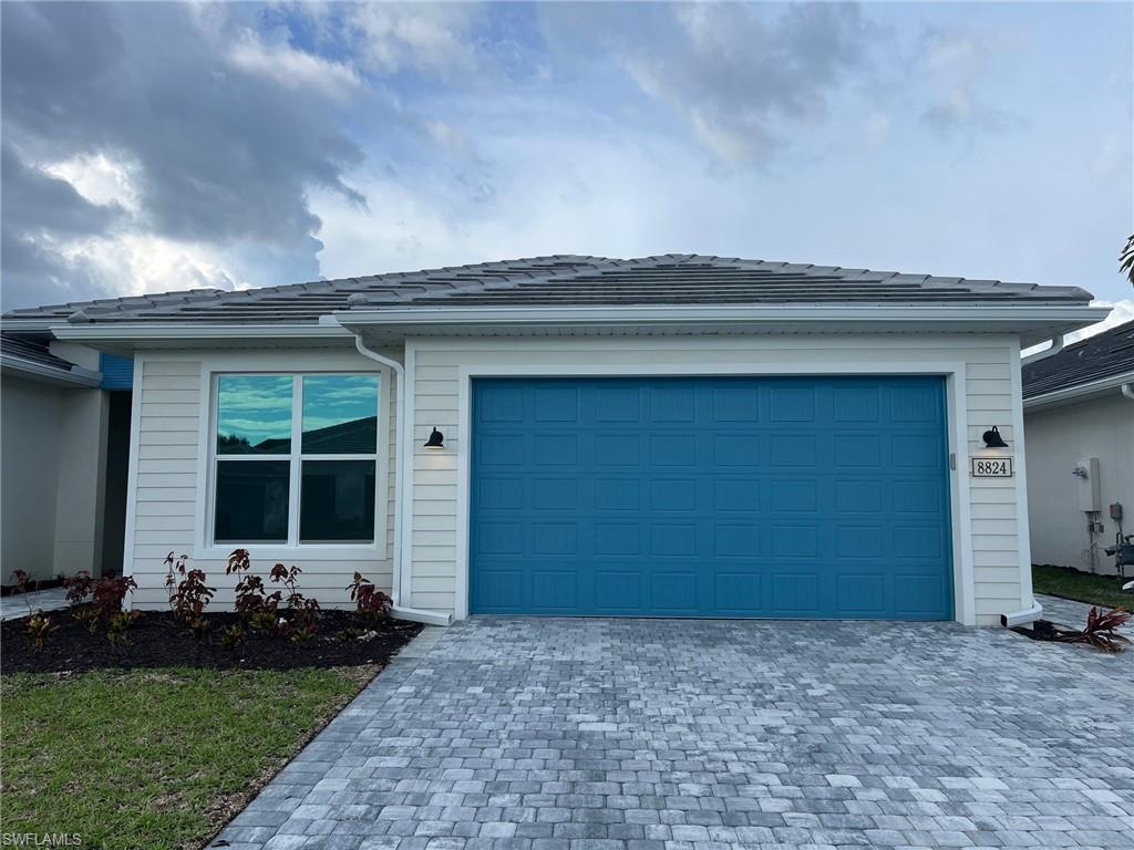 View of front facade with a garage