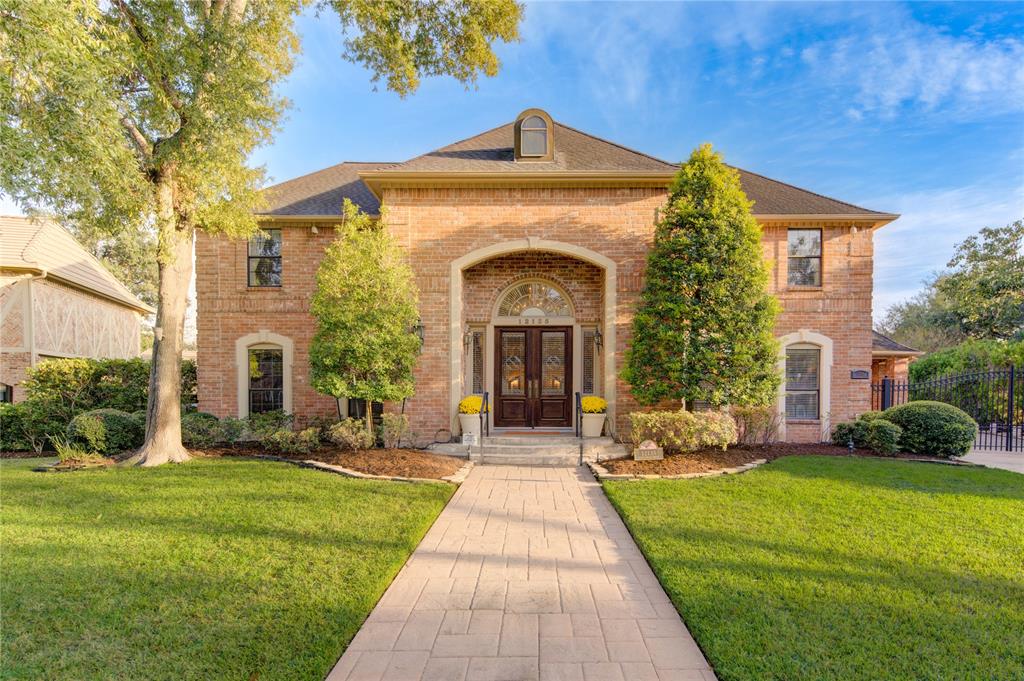 Welcome home to 12135 Maple Rock Drive. Nestled on a remarkable 2/3-acre wooded lot, this custom-built Charles Martin estate is a hidden gem in Houston.