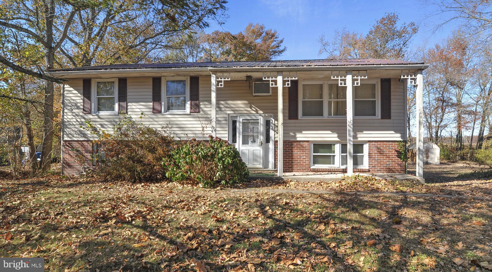 front view of house with a yard