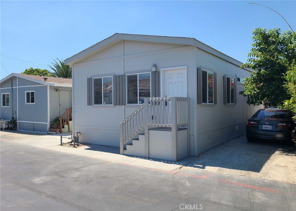 a front view of a house with a garage