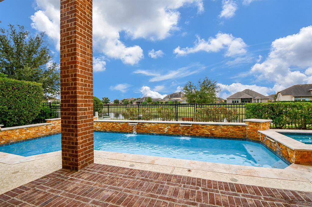 Beautiful sparkling pool with lake views but still lots of privacy GATED enclave