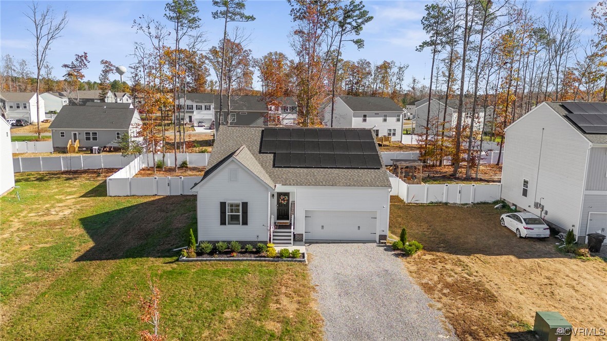 View of front of house featuring a front yard and