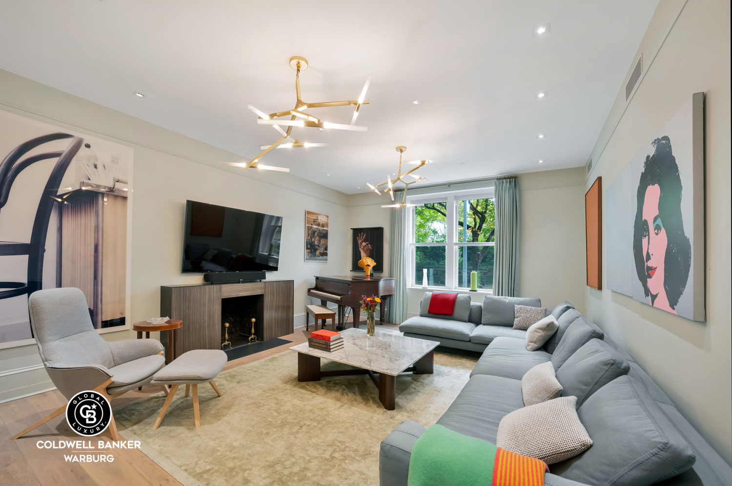 a living room with furniture fireplace and a flat screen tv