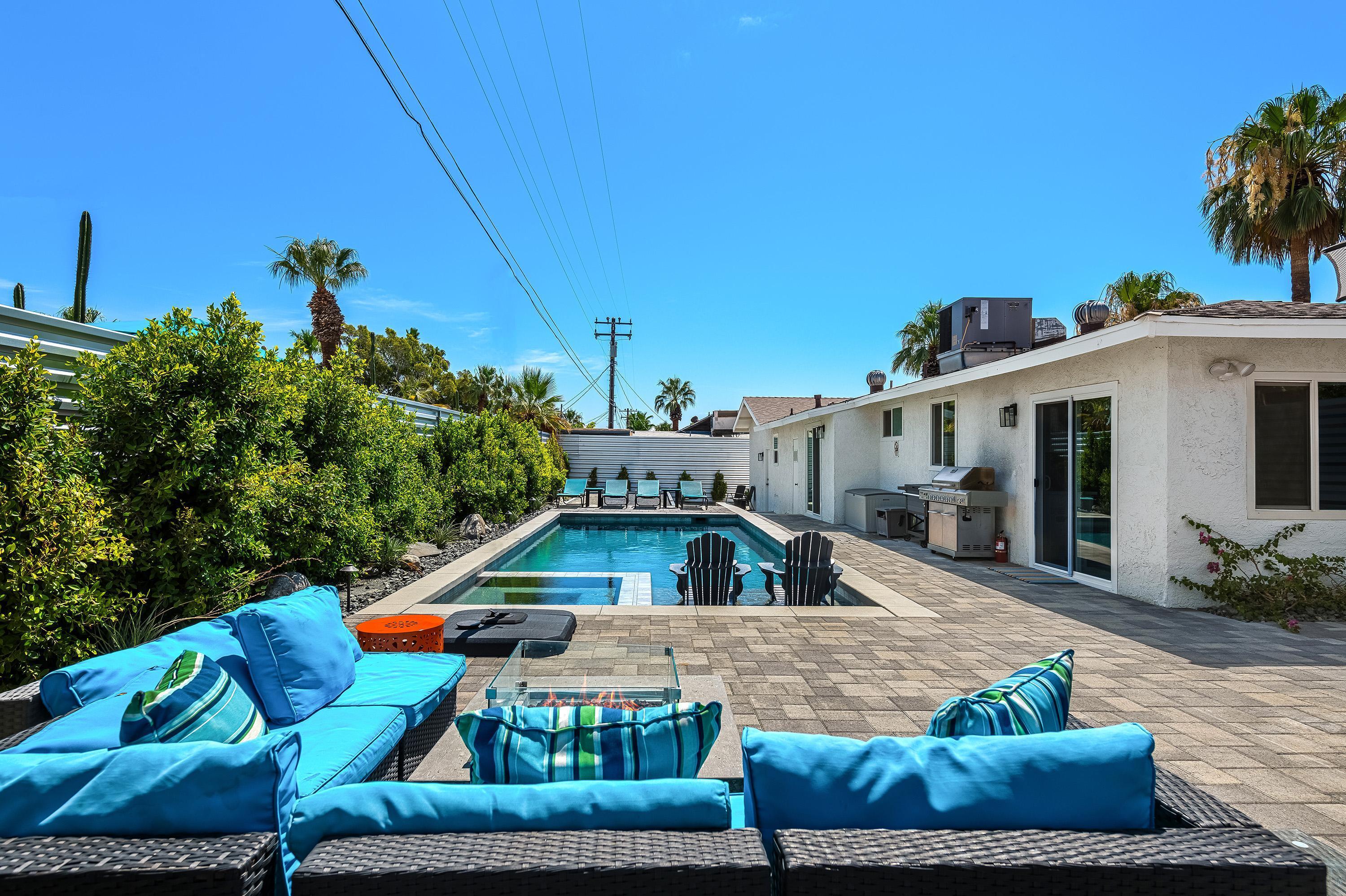 a view of yard with outdoor seating