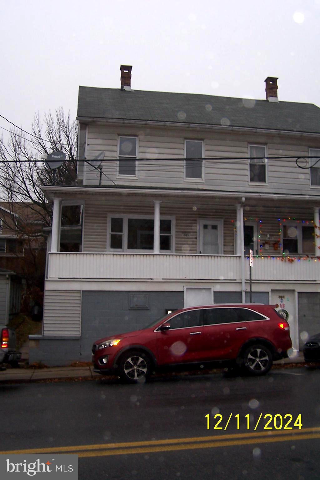 a car parked in front of a building