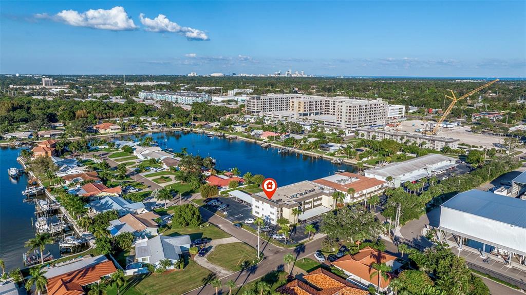 an aerial view of residential building and ocean