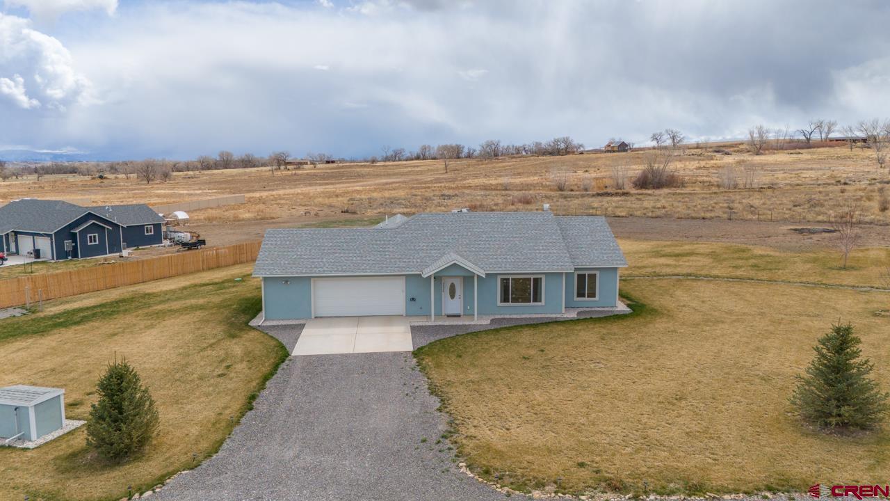 a view of a lake with a big yard