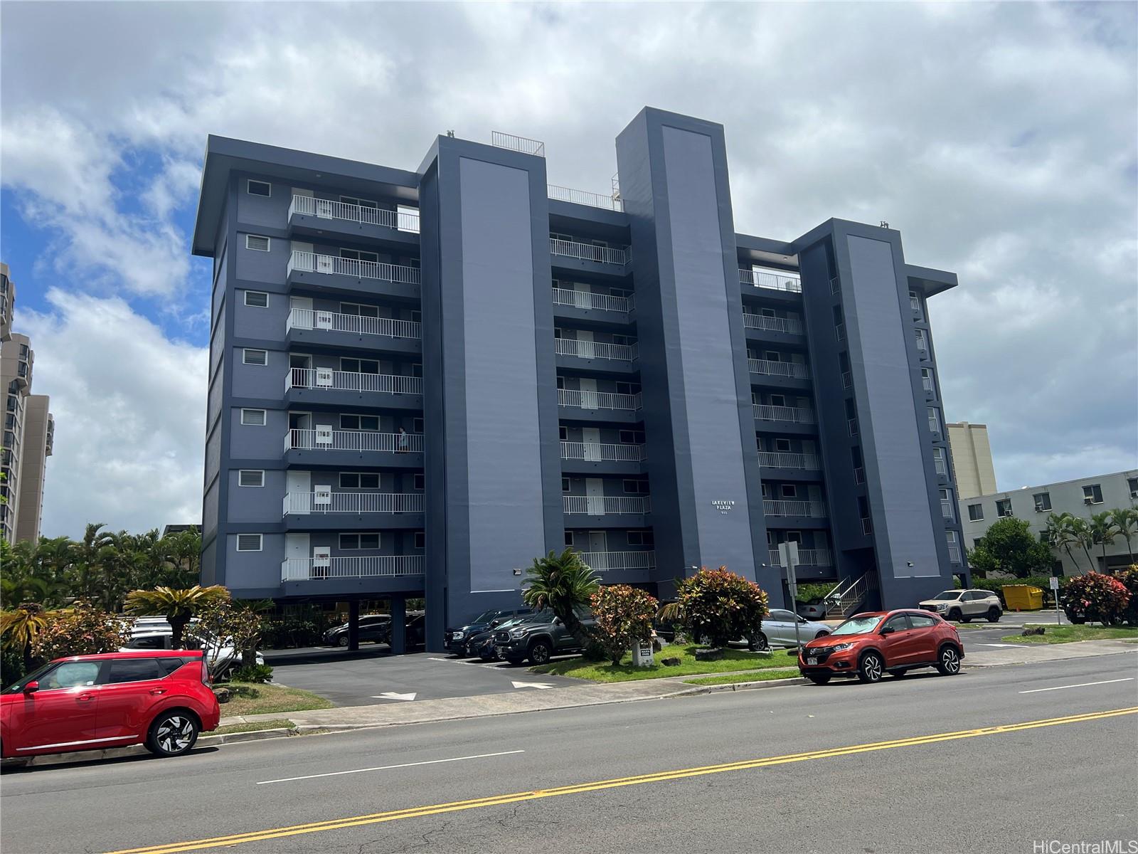 a cars parked in front of a building