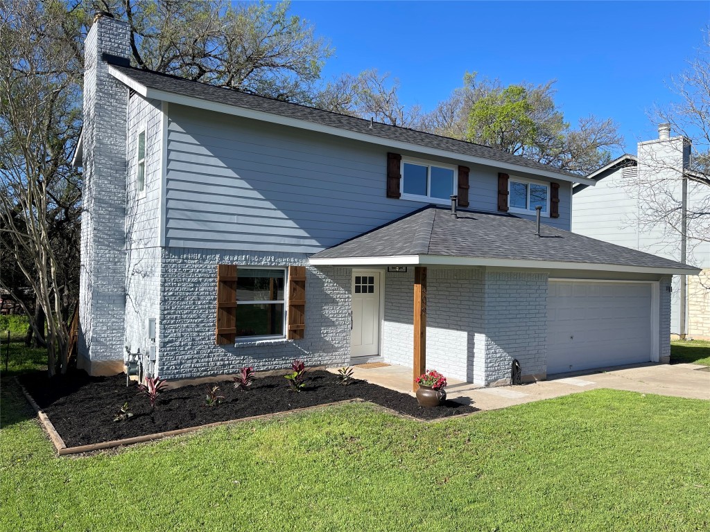 a front view of house with yard