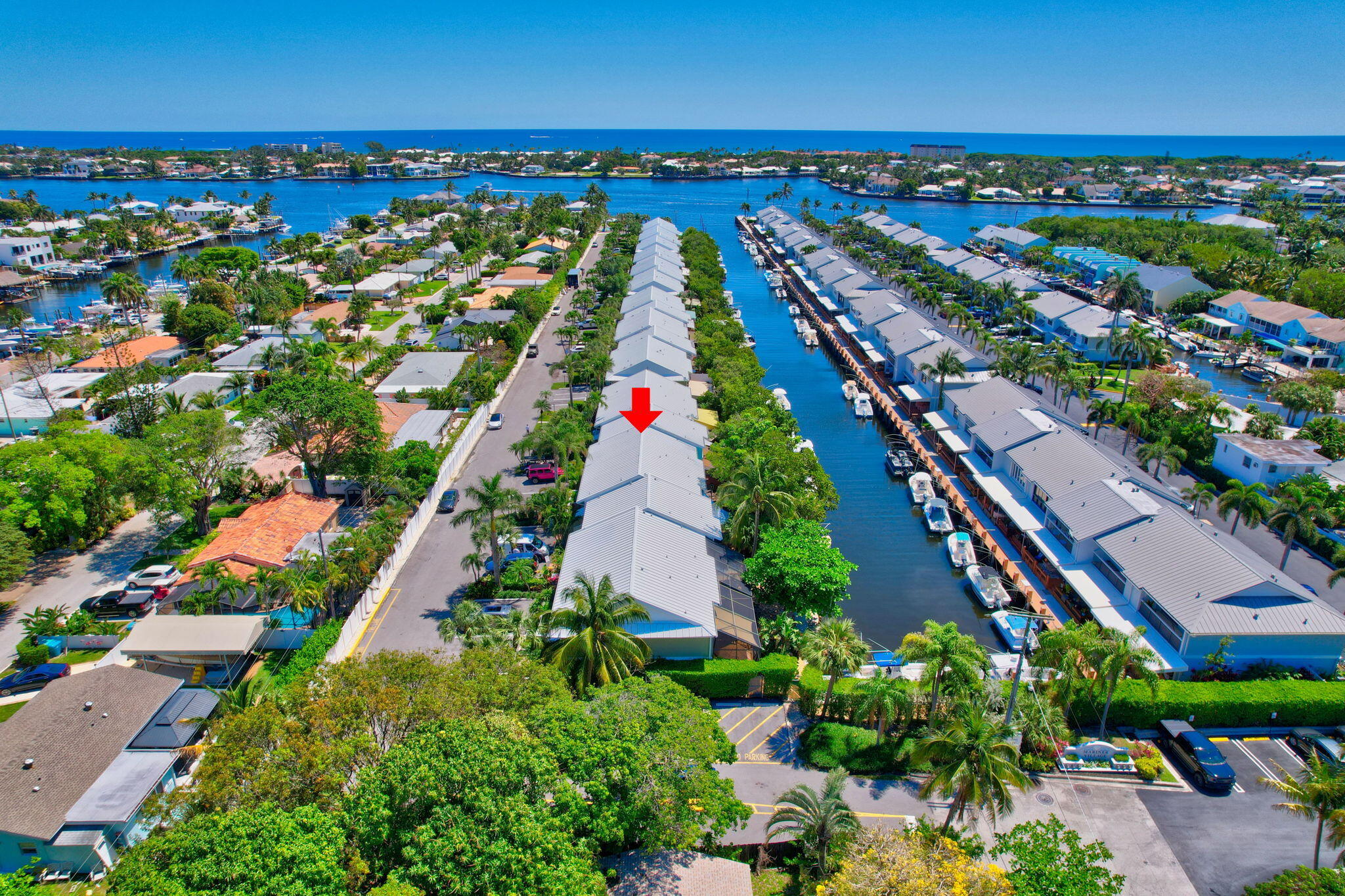 an aerial view of residential building and ocean