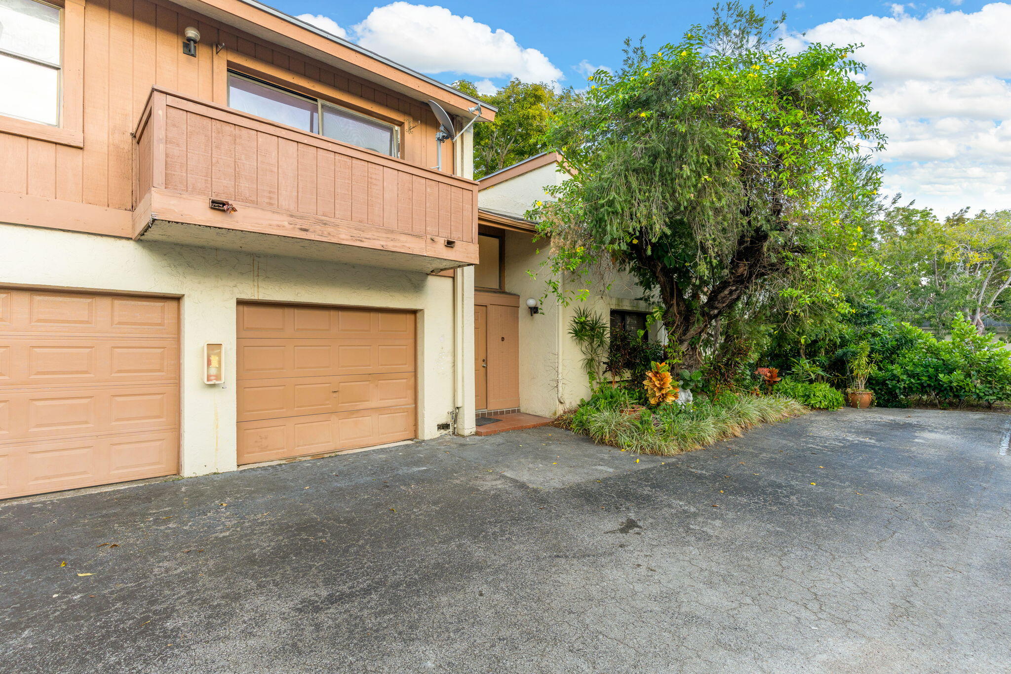 a view of a house with a garage