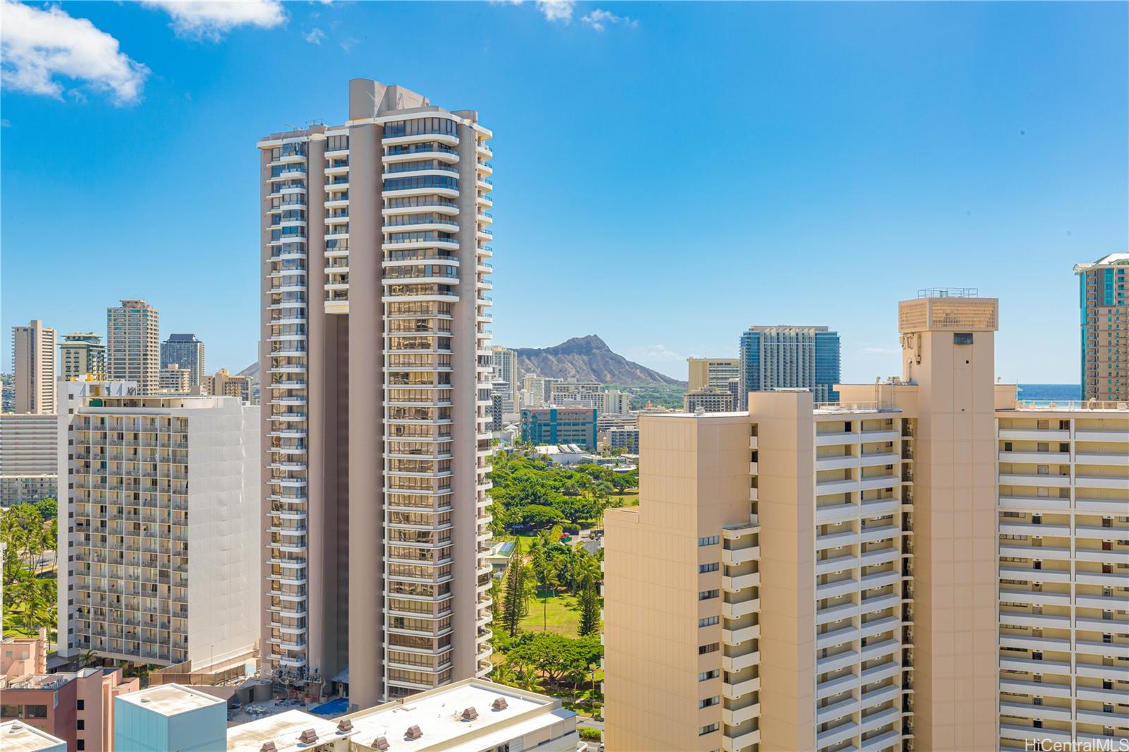 a view of city with tall buildings