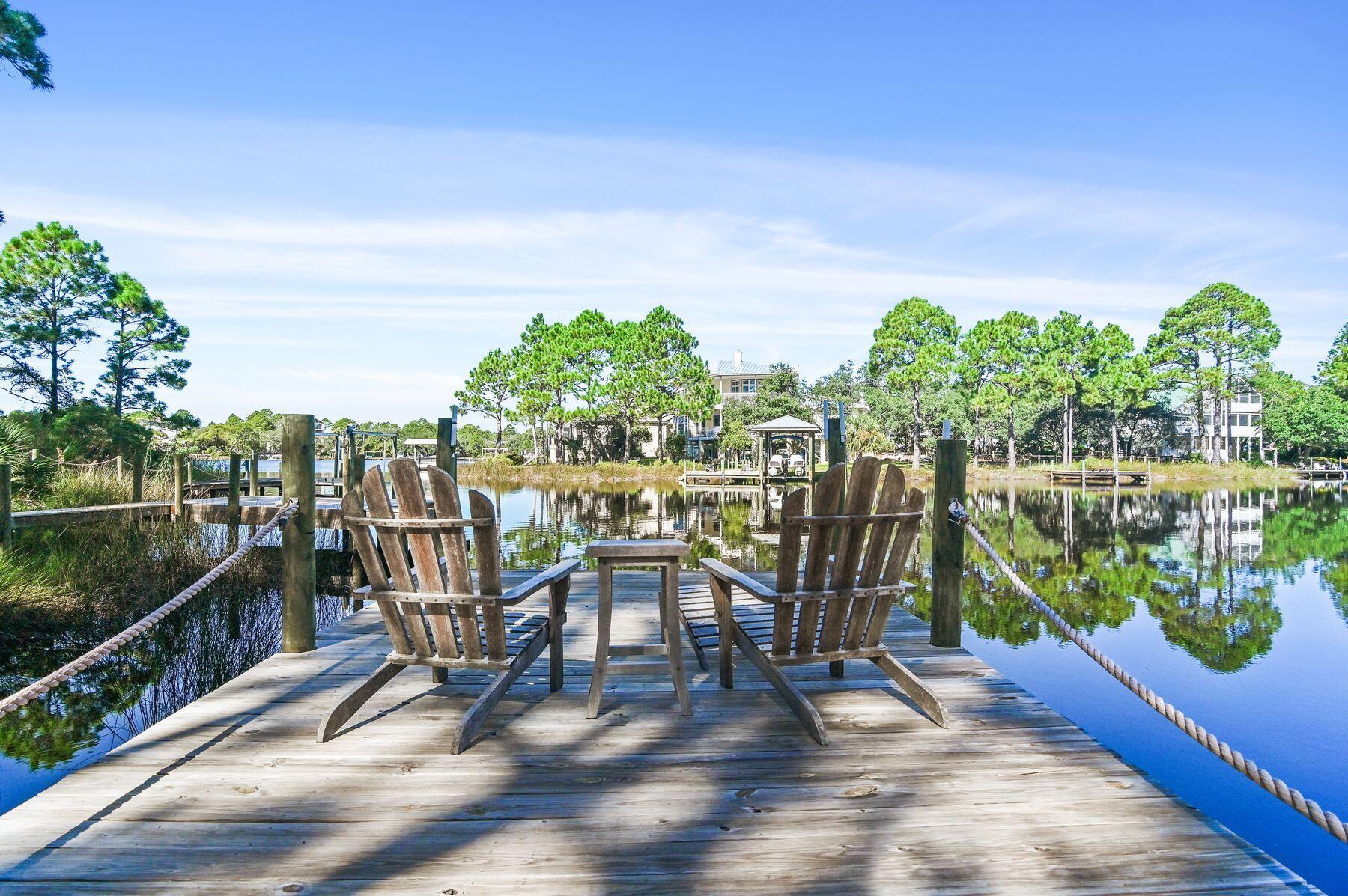 a view of a chairs and table in patio