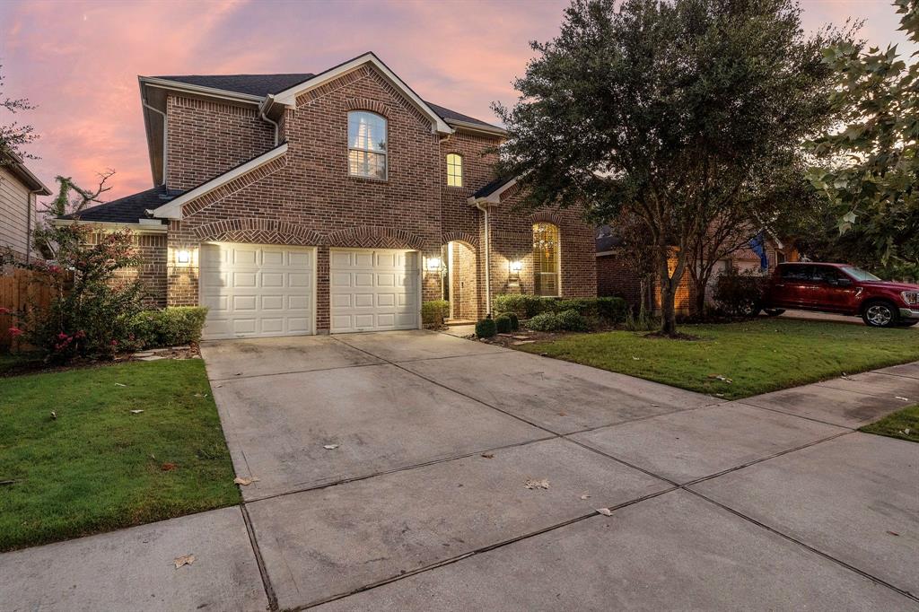 a front view of a house with yard