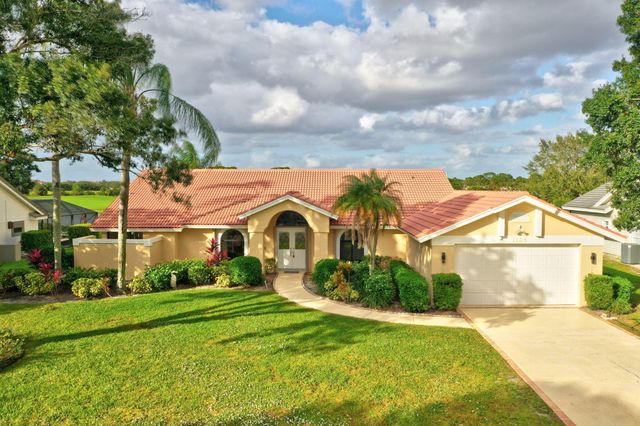 $599,900 | 1185 Southwest Bent Pine Cove | St. Lucie West Country Club