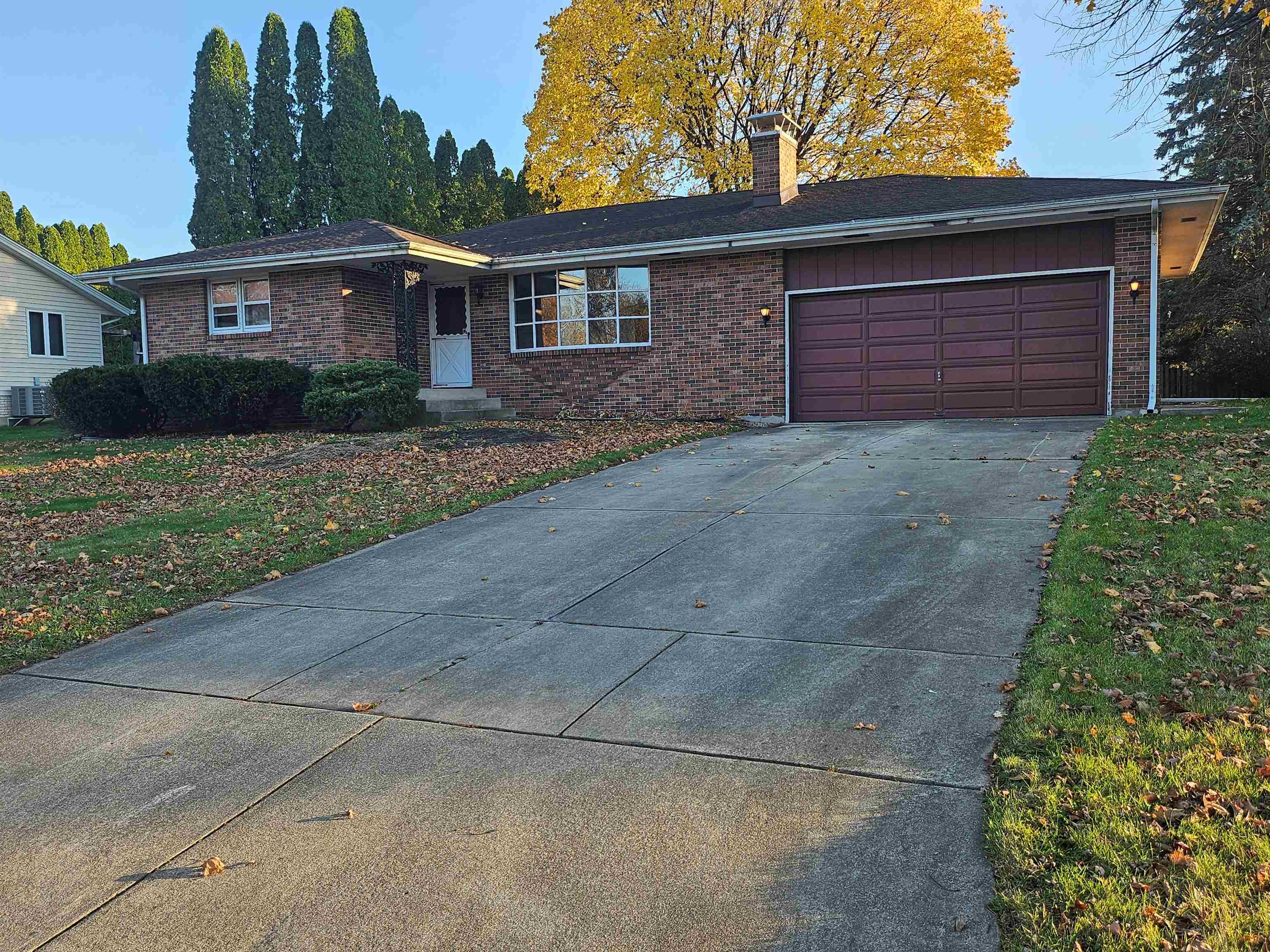 front view of a house and a yard