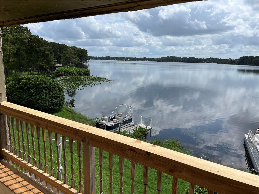 a view of a lake from a balcony