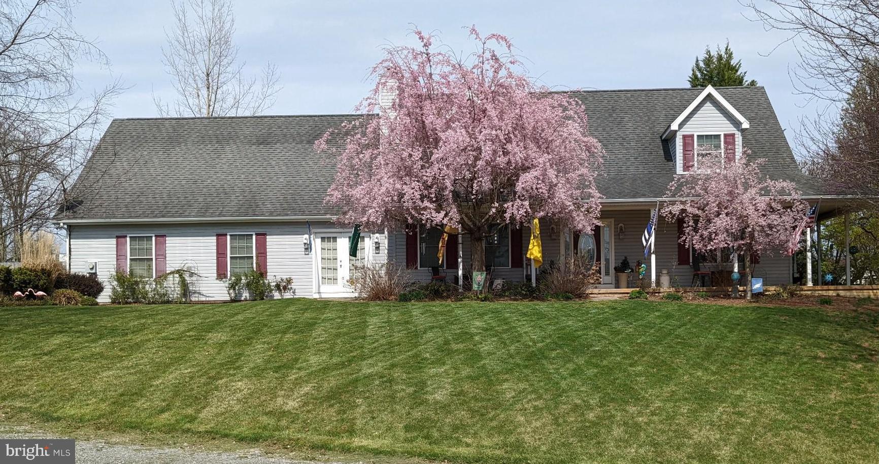 a view of a building with a yard